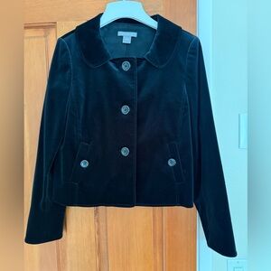 NWOT Ann Taylor black velvet jacket. Waist length, cute ruffle in back, Size 4